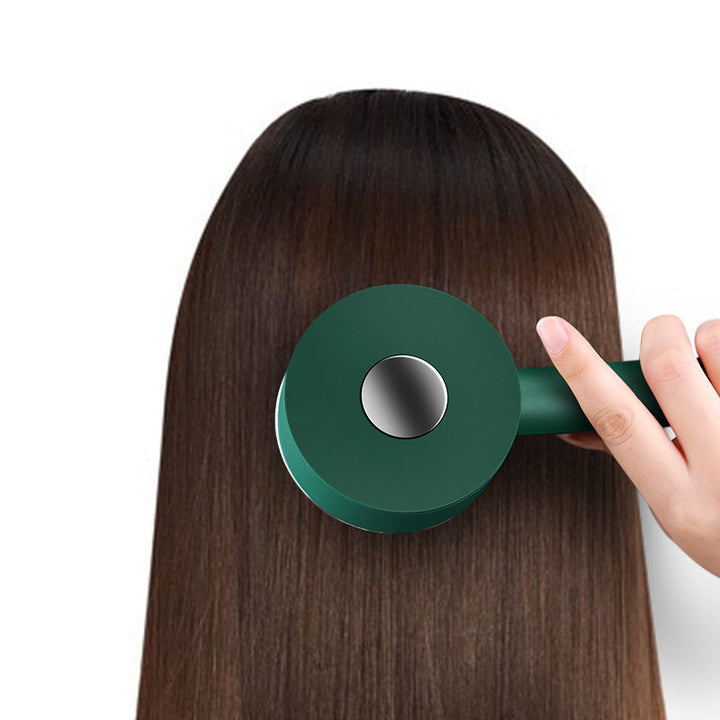 "Vit ergonomisk 3D luftkuddeborste med halkfritt handtag för skonsam hårvård och hårbottenmassage."