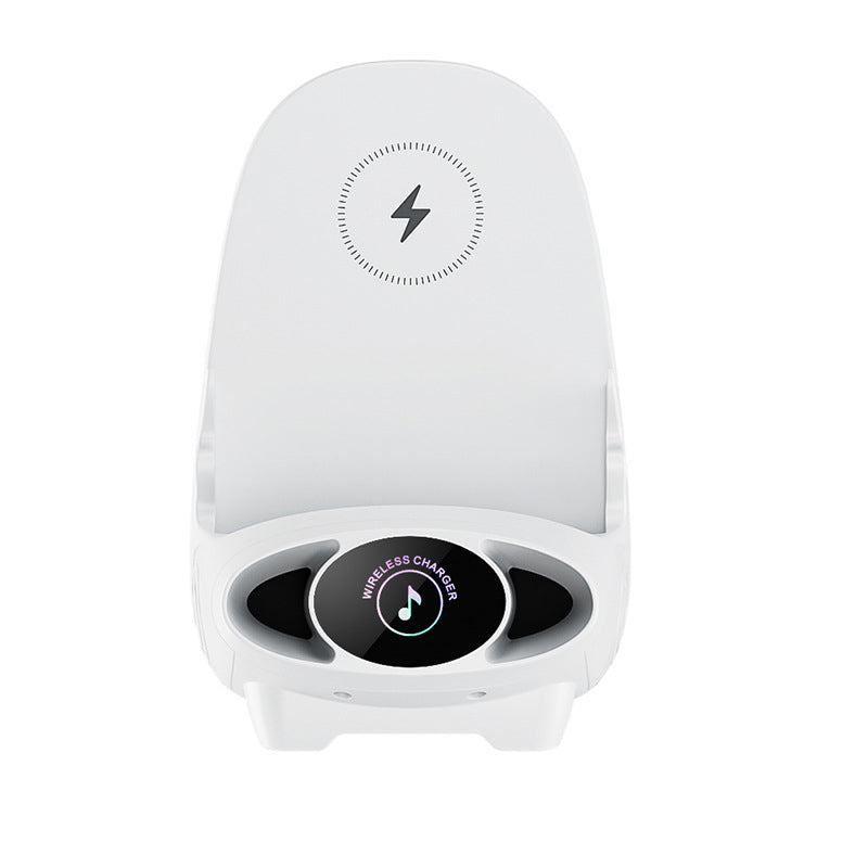 "Vit ministol trådlös snabbladdare på skrivbord, kombinerar stil och funktionalitet för Qi-aktiverade enheter."