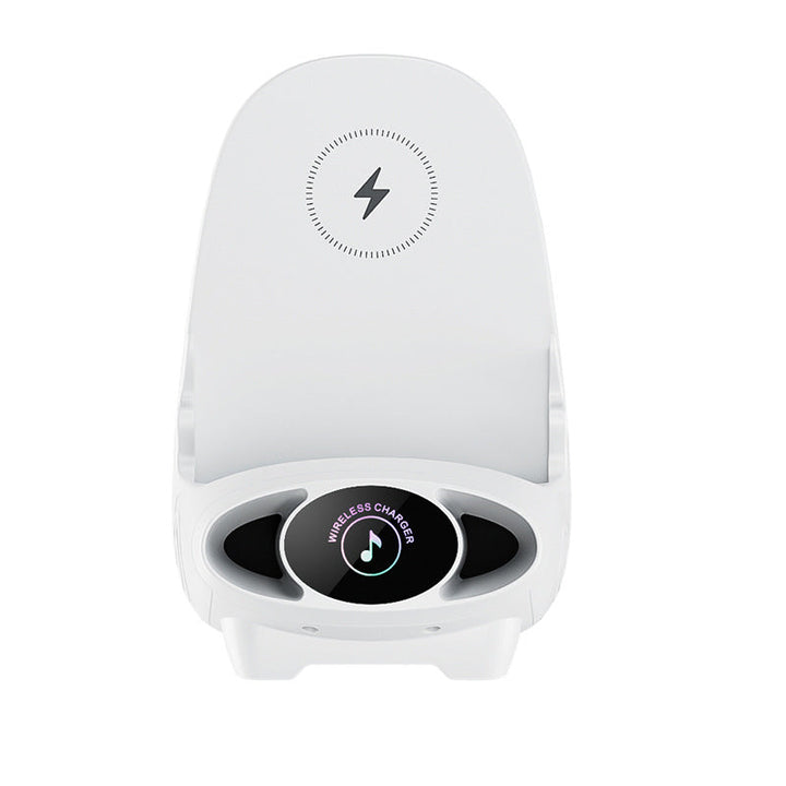 "Vit ministol trådlös snabbladdare på skrivbord, kombinerar stil och funktionalitet för Qi-aktiverade enheter."