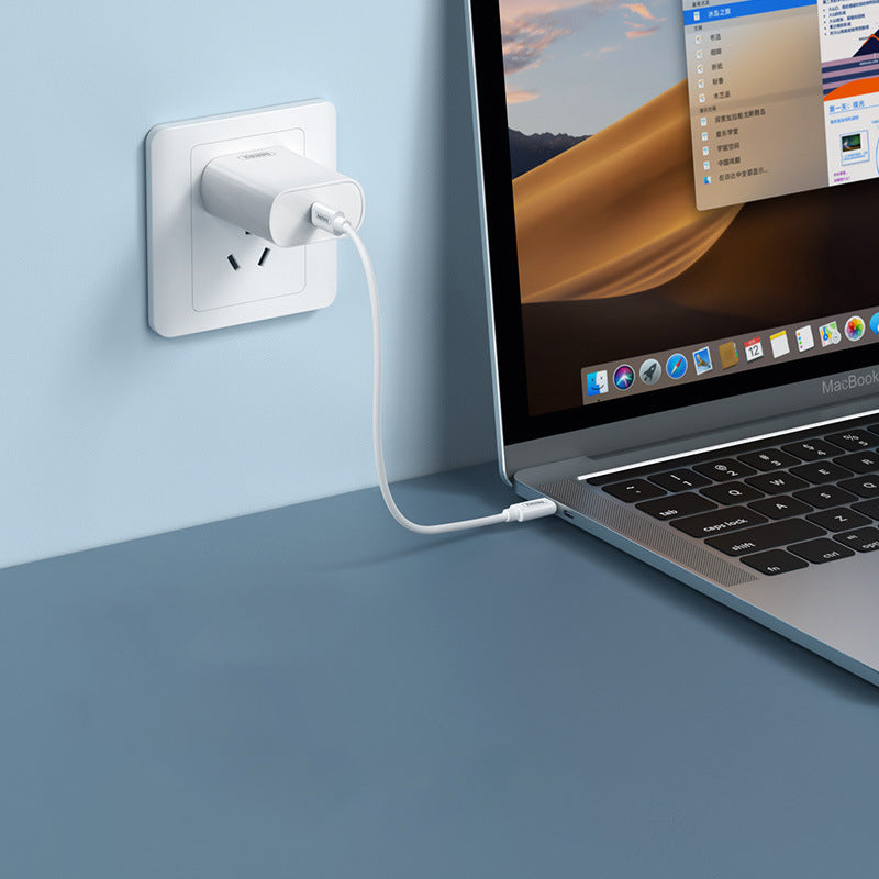 "Vit och blå mini multifunktionell förvaringsbox för digitala prylar med flera kablar och inbyggt telefonställ."