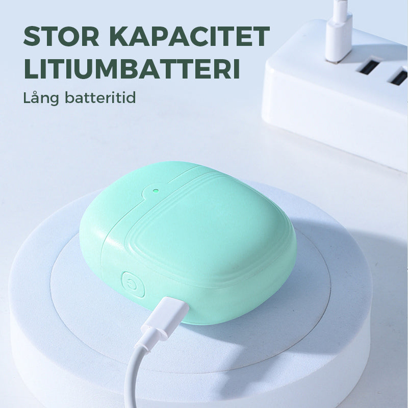 "Vit och grön elektrisk nagelklippare, smart design med ergonomisk grepp och inbyggd nagelspånssamlare."