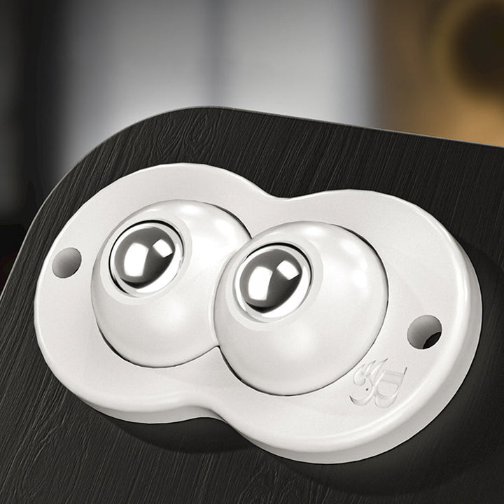 "Vita och svarta självhäftande mini 360° gummihjul; idealiska för enkel förflyttning av möbler och lådor i hemmet."