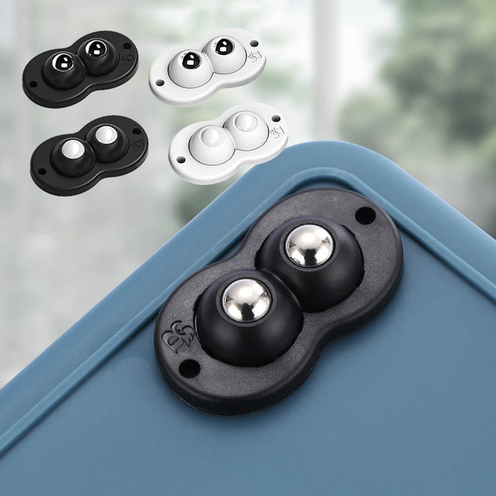 "Vita och svarta självhäftande mini 360° gummihjul; idealiska för enkel förflyttning av möbler och lådor i hemmet."